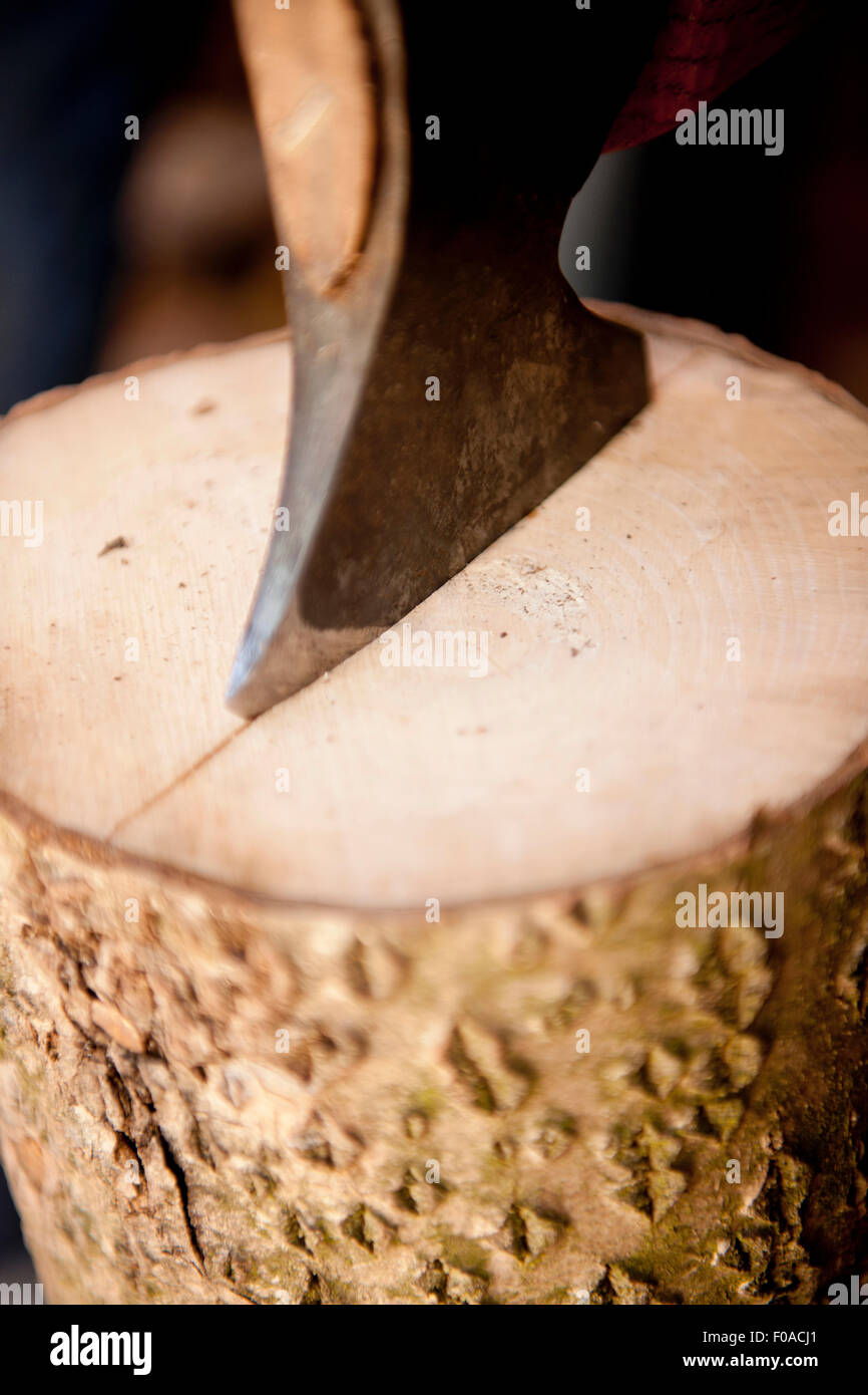 Axe splitting wood, close-up Stock Photo