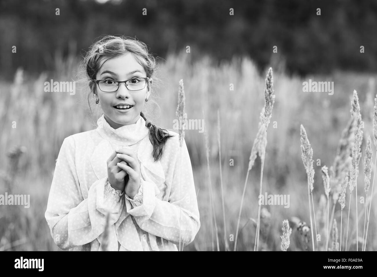 Adorable girl in glasses Stock Photo