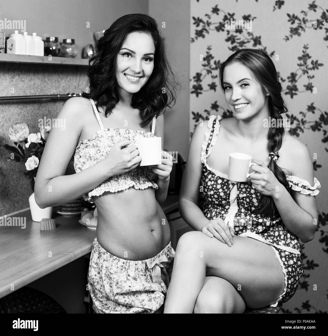 Two Women In Kitchen Stock Photo
