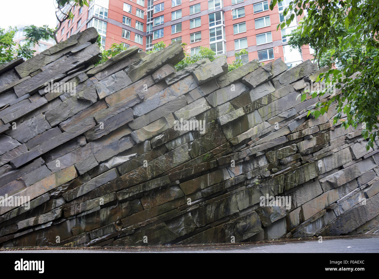 A stone wall in Teardrop Park, Battery Park City, Manhattan. The 1.8 acre park was designed by Michael Van Valkenburgh. Stock Photo