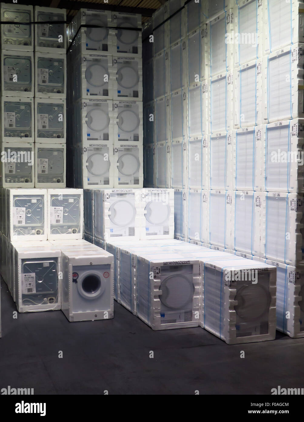 White goods stacked in warehouse Stock Photo