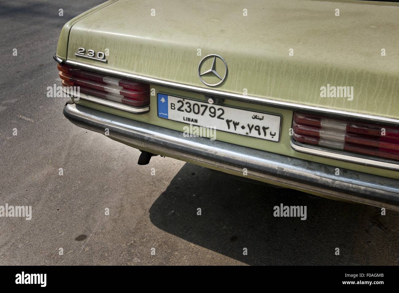 Close-up of license plate of old Mercedes 230 line 8,8 in green colour in Beirut, Lebanon Stock Photo