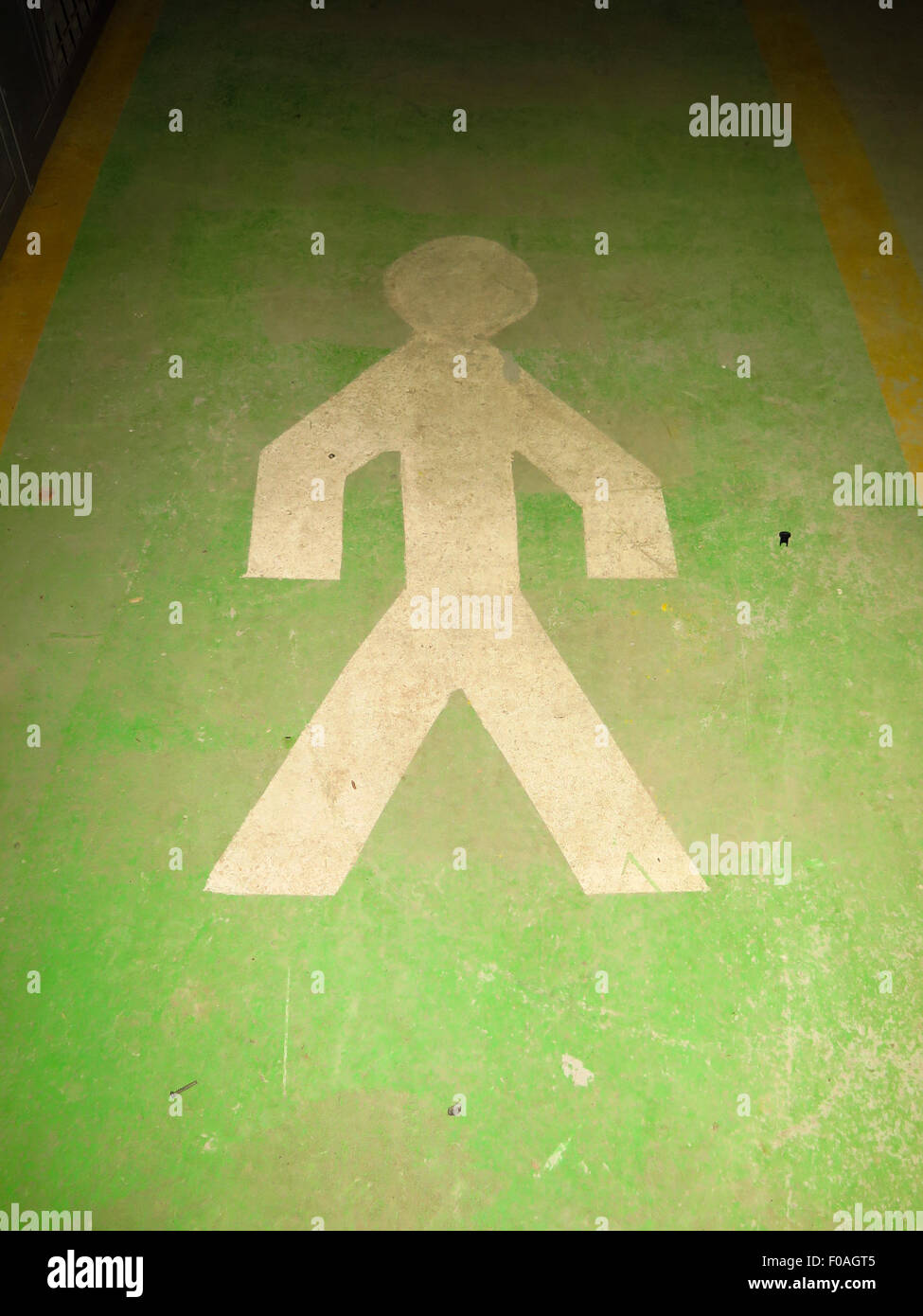 Painted man figure on concrete floor Stock Photo