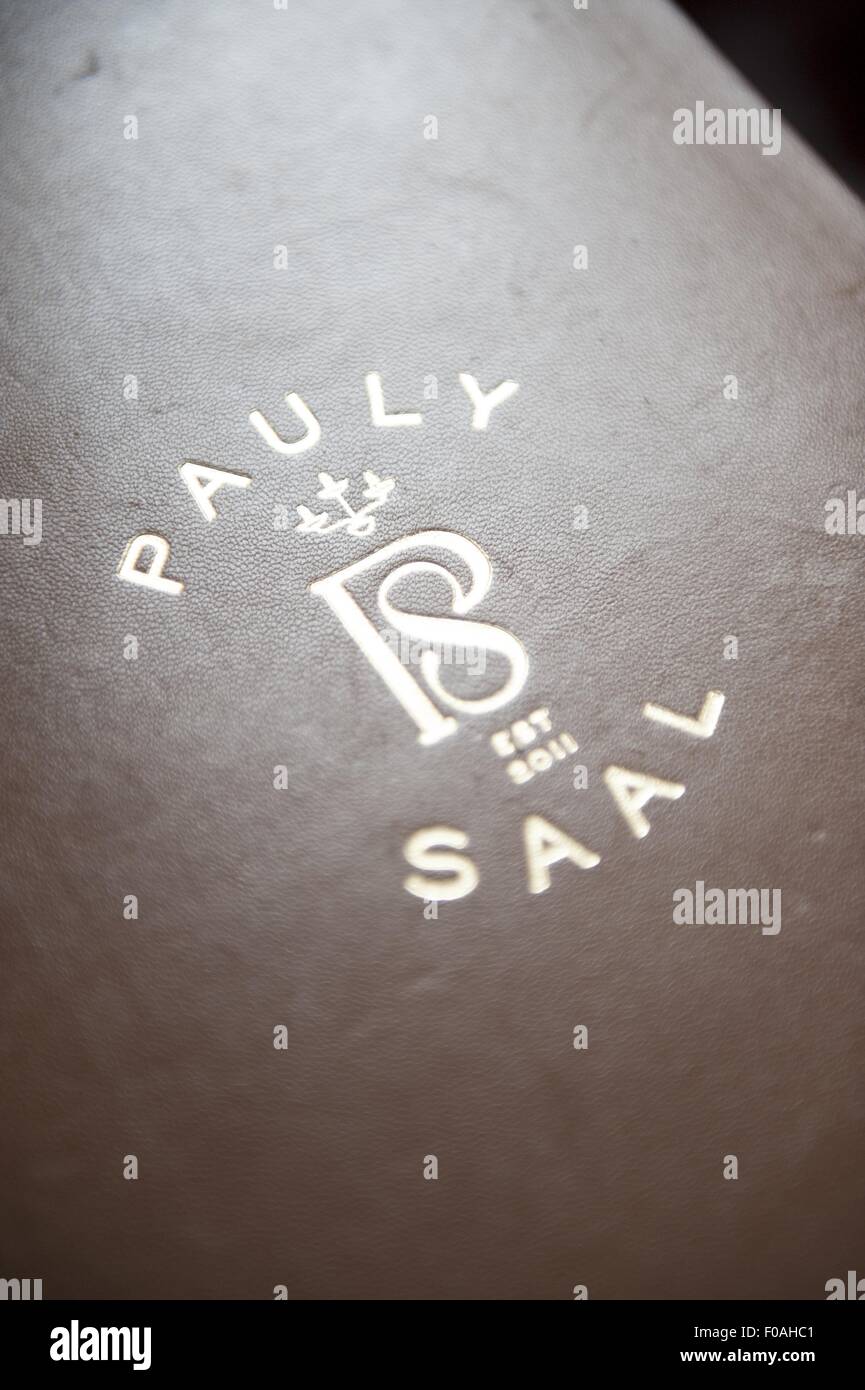 Close-up of Pauly Saal bar logo in Berlin, Germany Stock Photo