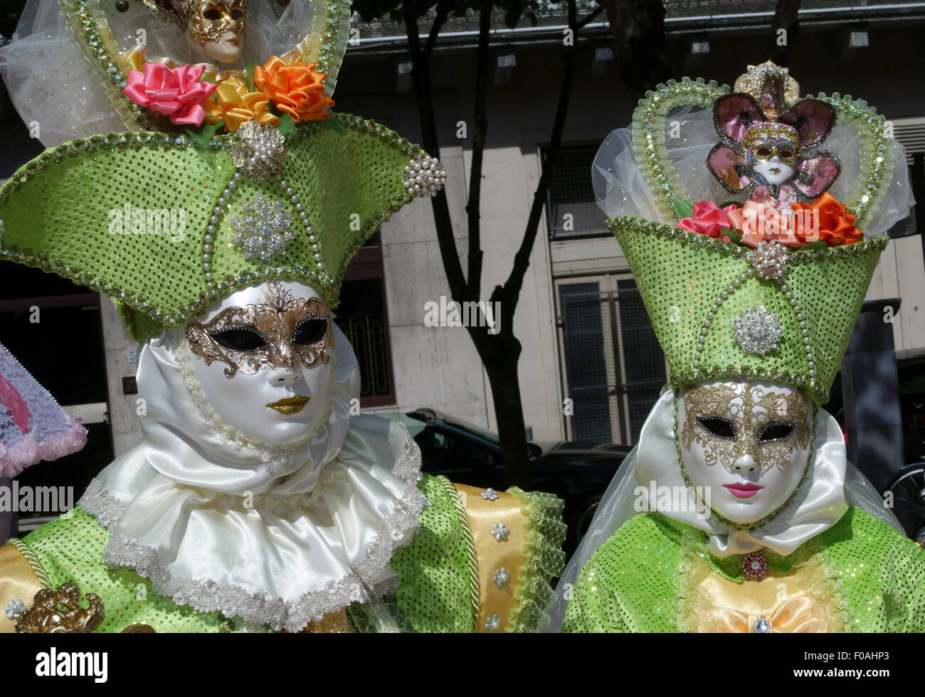 Performers wear Venice Carnival style costumes and masks for Italian festival in Pau, France Stock Photo