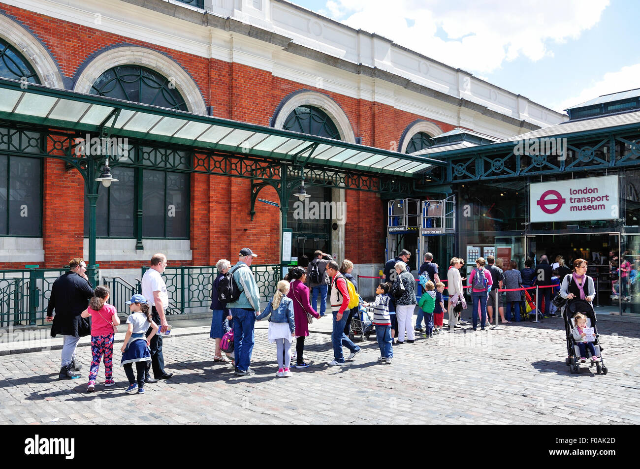 Queue at entrance to London Transport Museum, Covent Garden, City of Westminster, London, England, United Kingdom Stock Photo