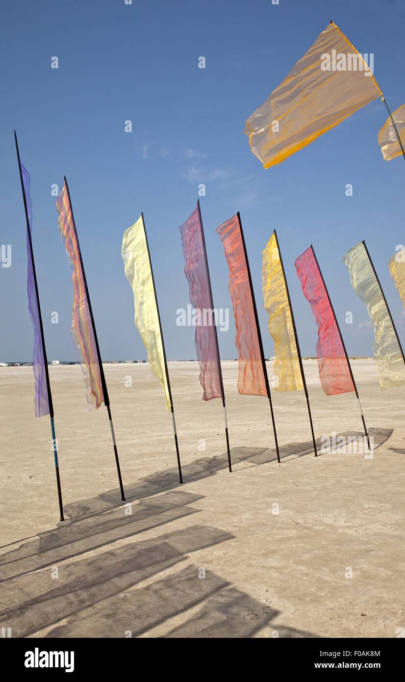 Multi coloured flags at kite festivals at Fano beach, Denmark Stock