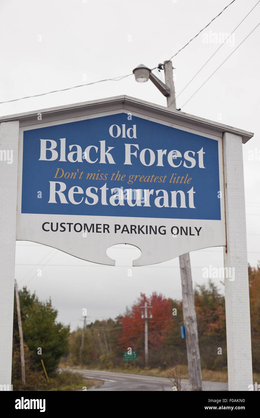 Signboard of Old Black Forest on road in Lunenburg, Nova Scotia, Canada Stock Photo