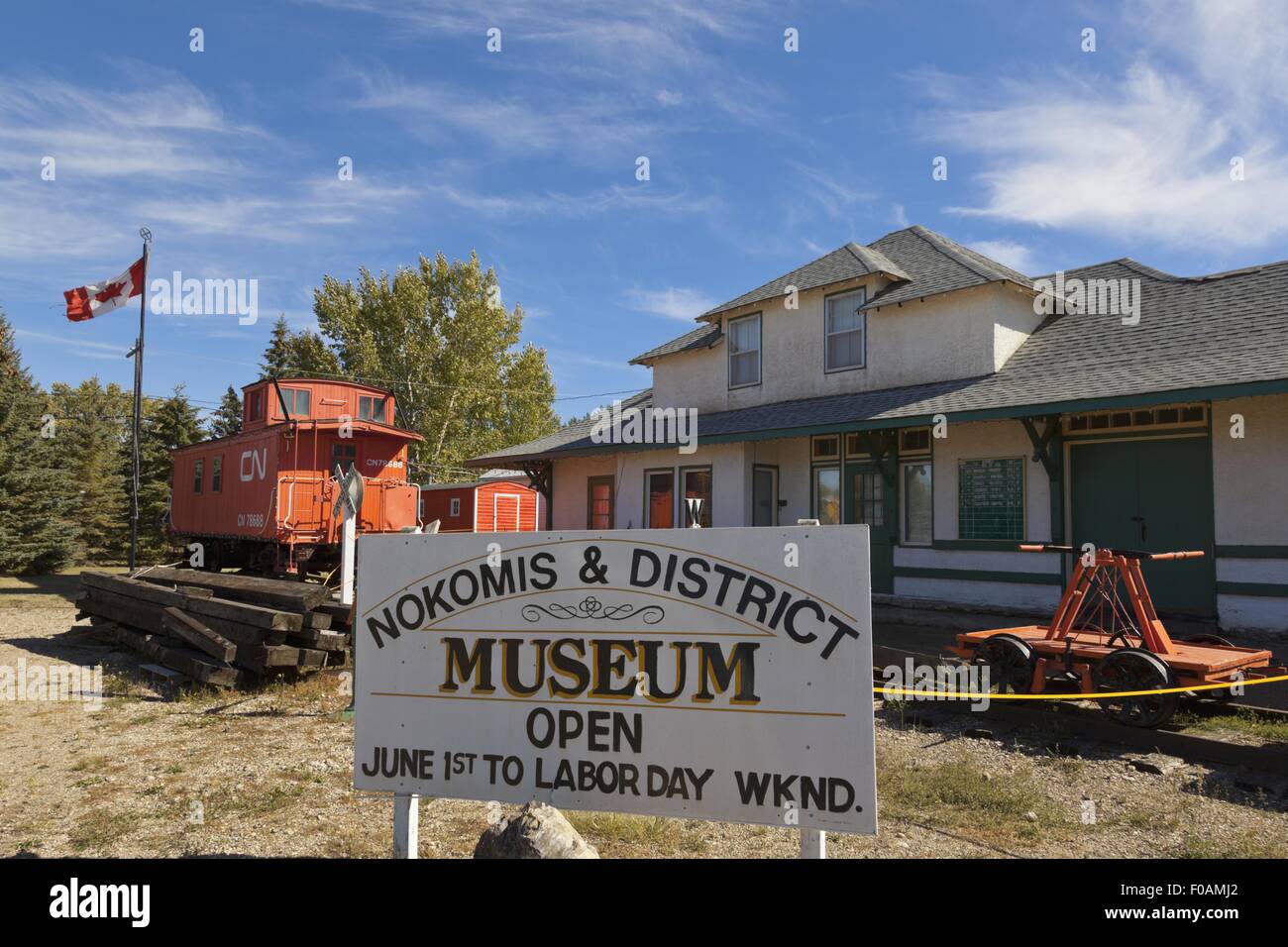 Signboard of Museum in Nokomis with old trains and house, Saskatchewan, Canada Stock Photo