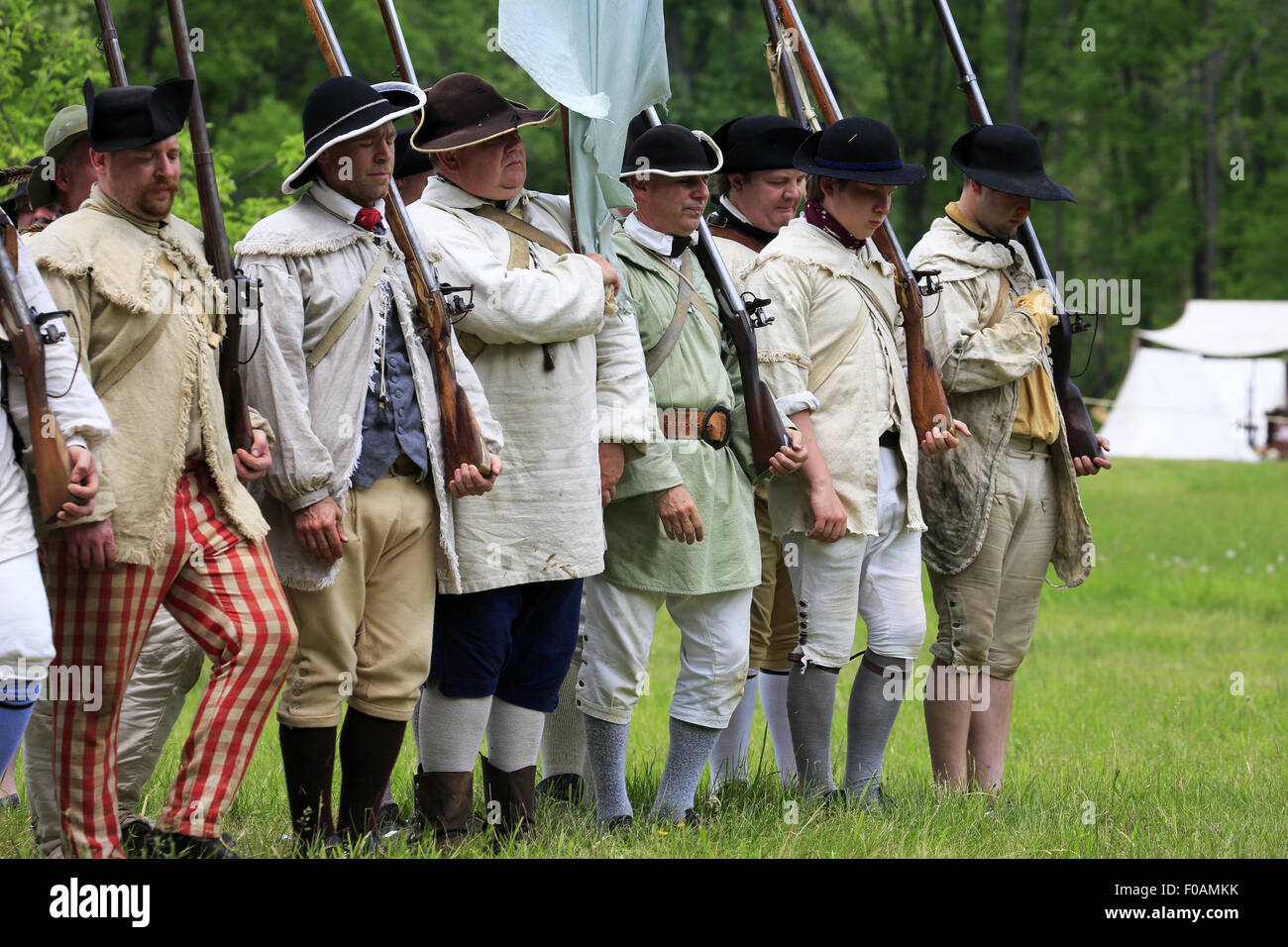Continental Army marching on field of Jockey Hollow during Revolutionary war reenactment in Morristown National Historical Park Stock Photo