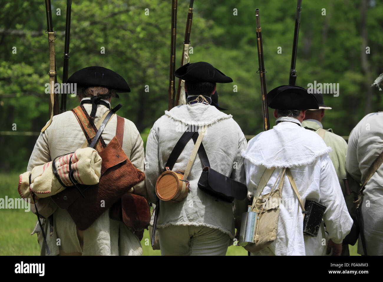 Continental Army marching on field of Jockey Hollow during Revolutionary war reenactment in Morristown National Historical Park Stock Photo