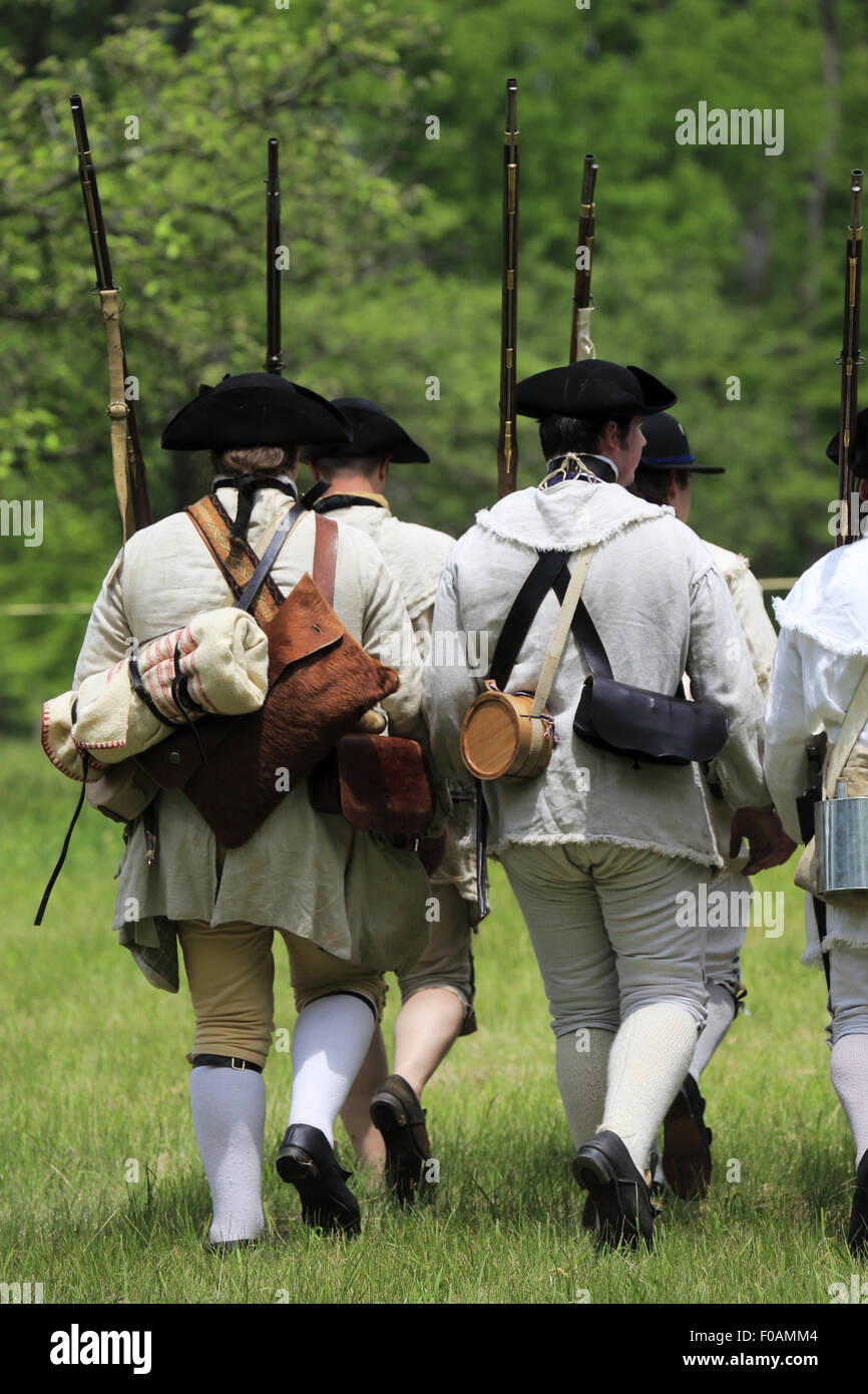 Continental Army marching on field of Jockey Hollow during Revolutionary war reenactment in Morristown National Historical Park Stock Photo