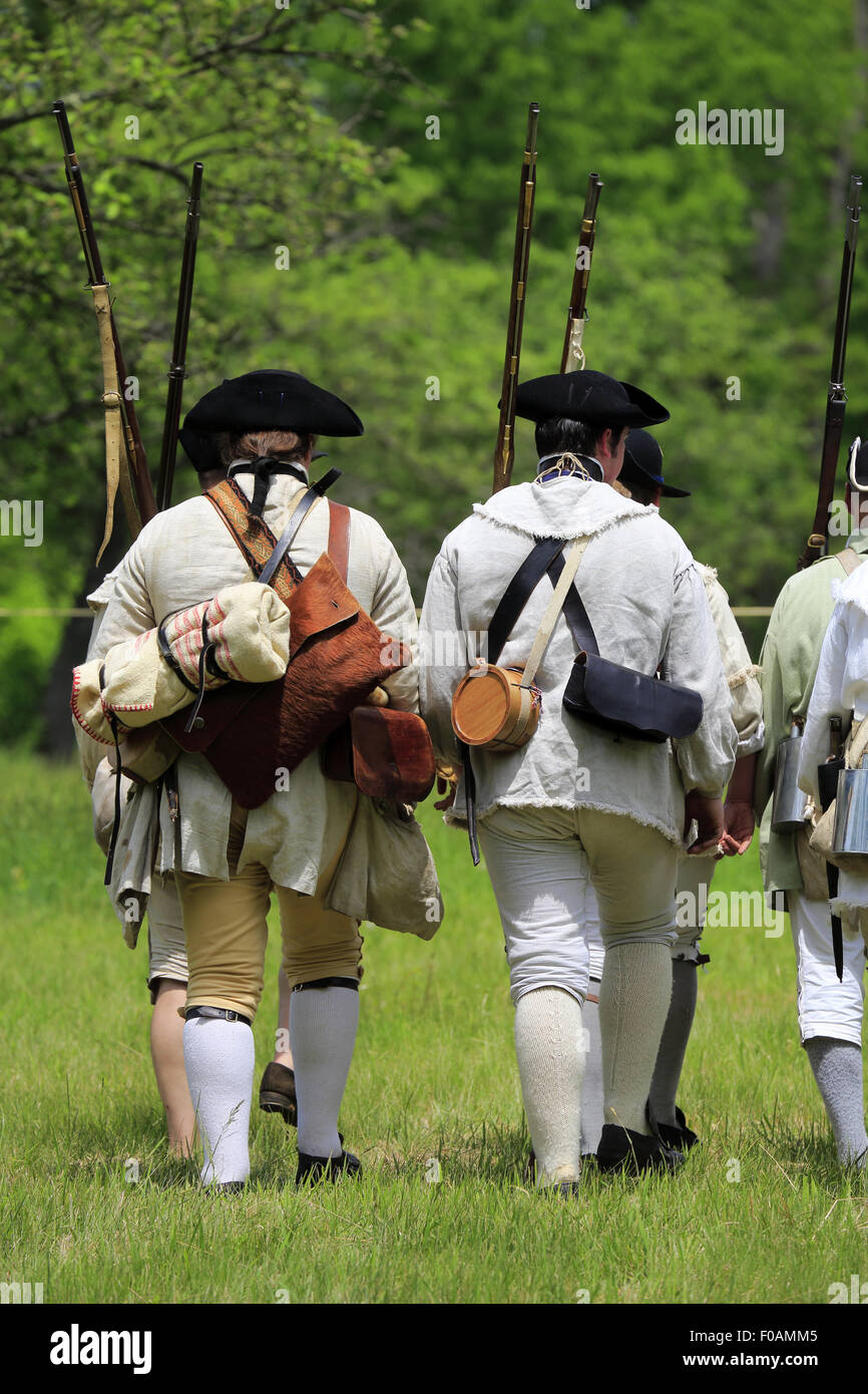 Continental Army marching on field of Jockey Hollow during Revolutionary war reenactment in Morristown National Historical Park Stock Photo