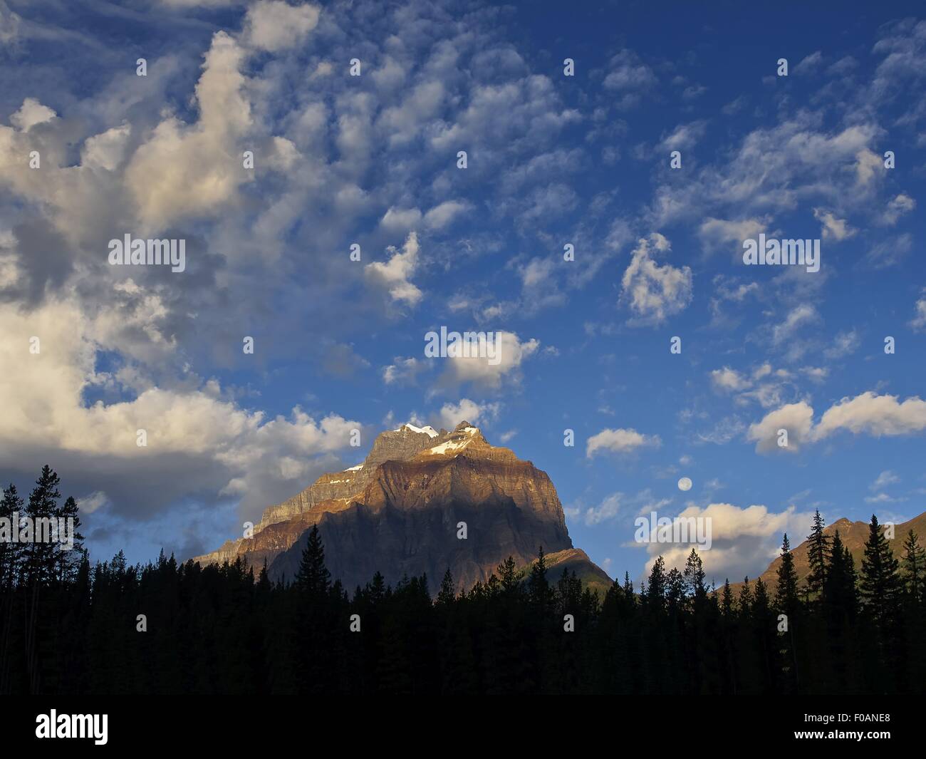 Cloudy blue sky, mountain, highway 1, lake Moraine, Banff National Park ...
