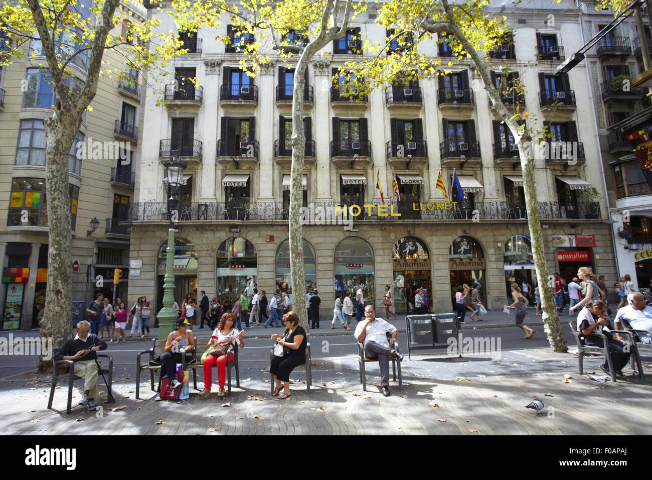 People shopping at La Rambla Las Ramblas shopping street in Barcelona, Spain Stock Photo