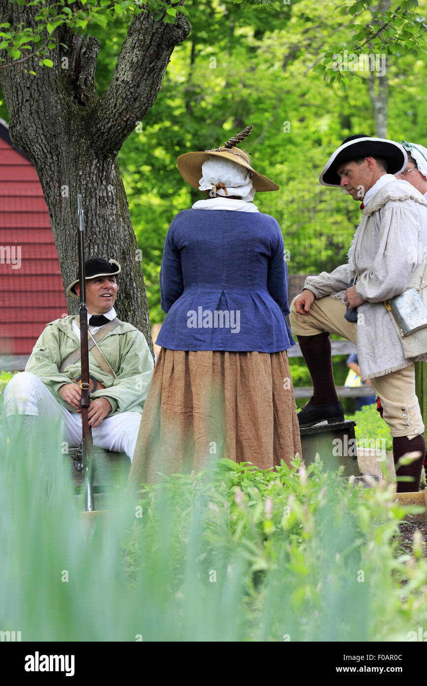 Historical reenactors in vegetable garden at Jockey Hollow Encampment during Revolutionary War Reenactment Morristown NJ USA Stock Photo