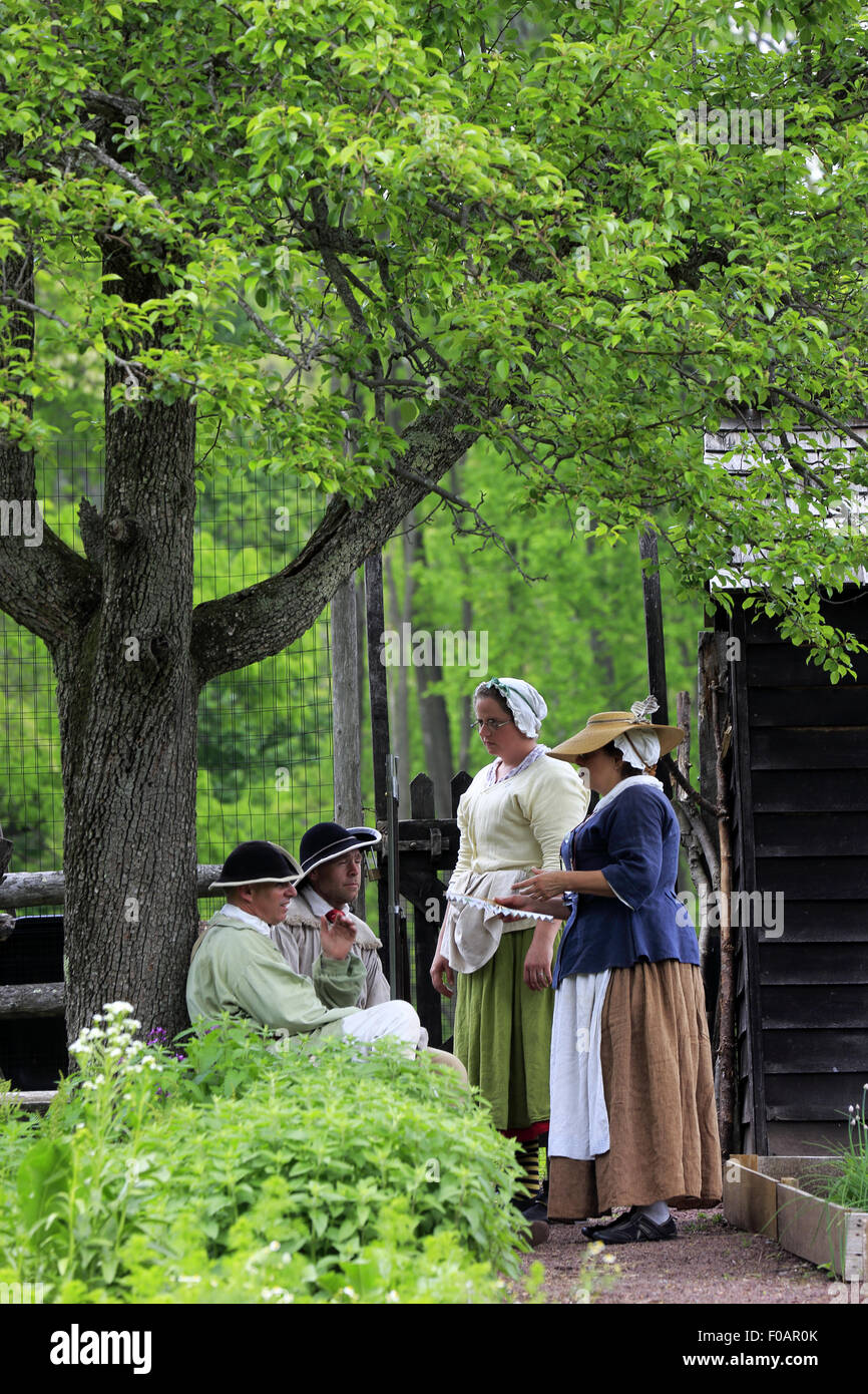 Historical reenactors in vegetable garden at Jockey Hollow Encampment during Revolutionary War Reenactment Morristown NJ USA Stock Photo