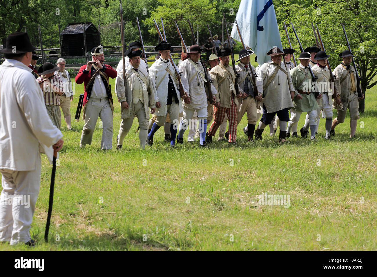 Continental Army soldiers with muskets in Revolutionary War reenactment.Jockey Hollow,Morristown National Historical Park,New Jersey.USA Stock Photo