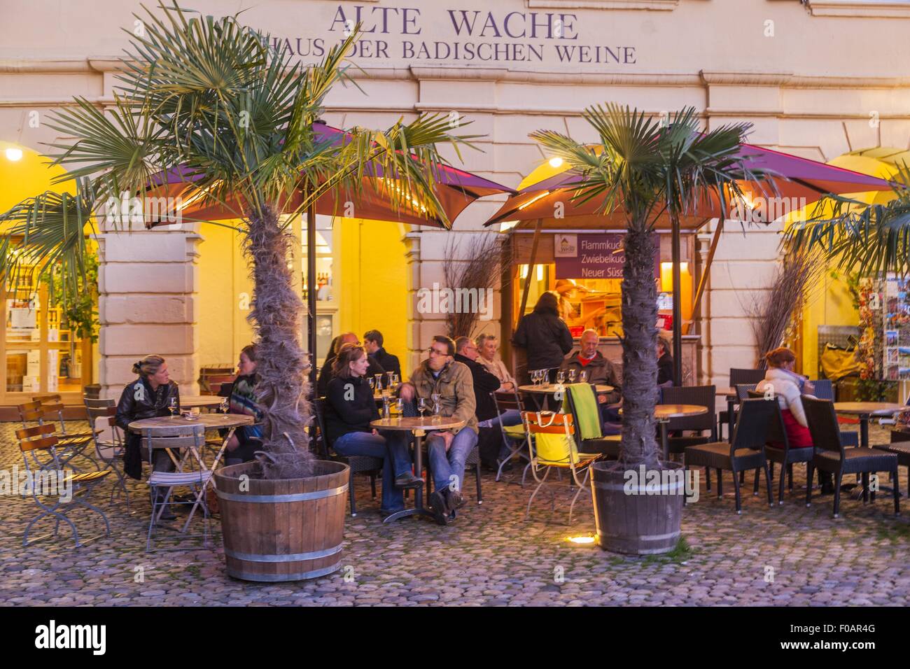 People sitting outside tavern Big Meyerhof in Old Town Freiburg, Germany, Stock Photo