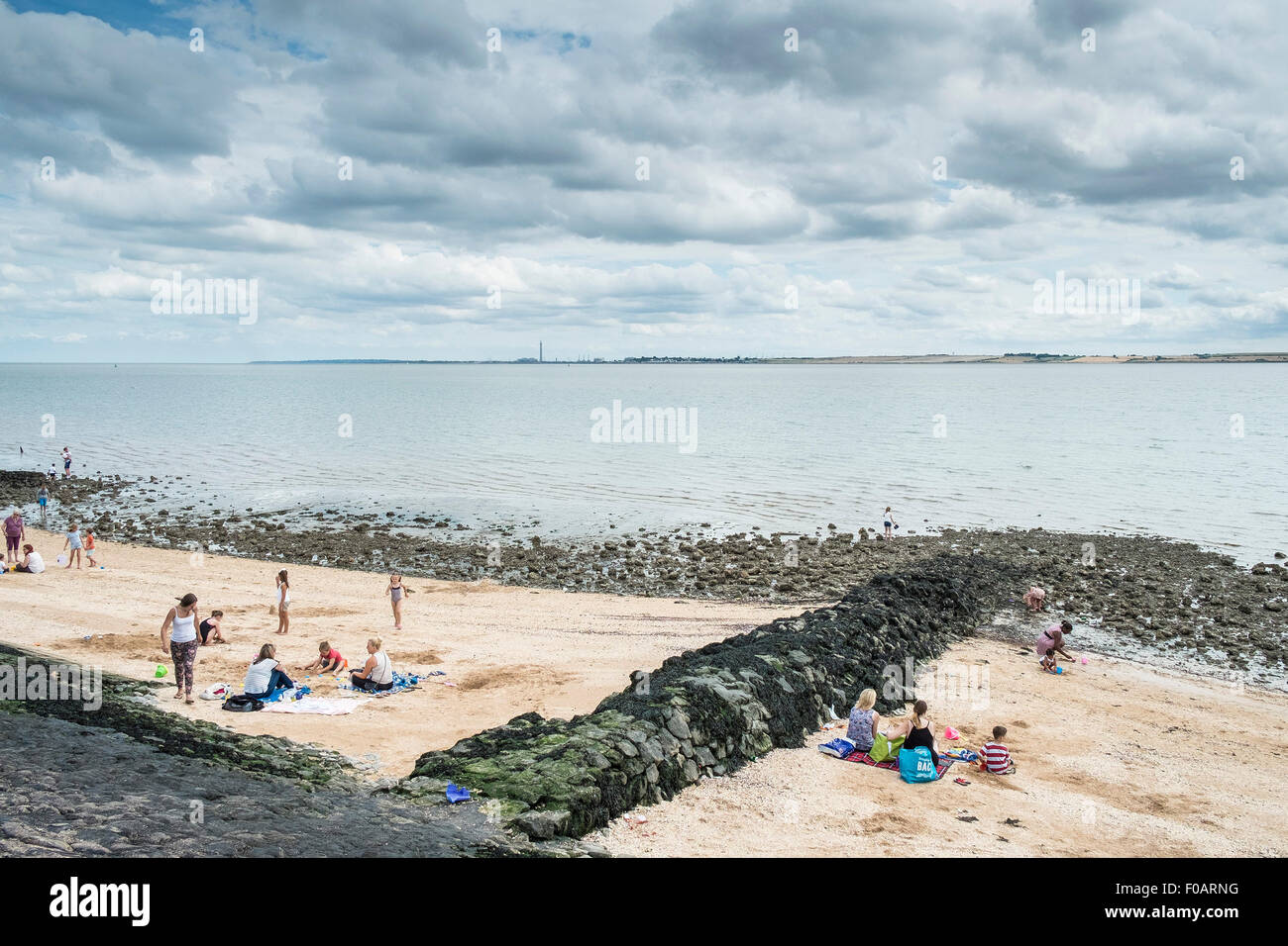 Canvey Island Families Relaxing On The Beach At Canvey Island Es canvey-island-families-relaxing-on-the-beach-at-canvey-island-es