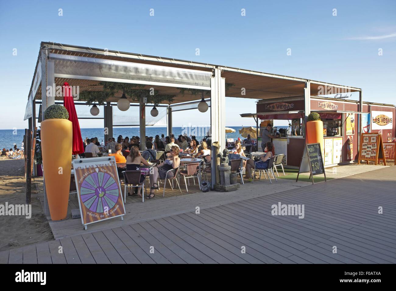People sitting at Princesa 23 beach bar at Barcelona, Spain Stock Photo