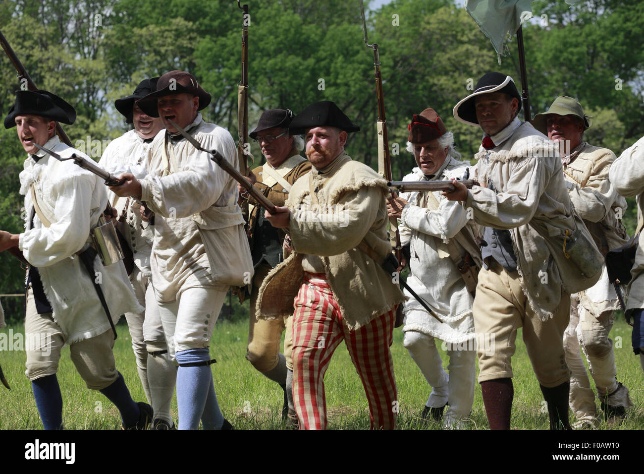 Continental Army soldiers with muskets in Revolutionary War reenactment.Jockey Hollow,Morristown National Historical Park,New Jersey.USA Stock Photo