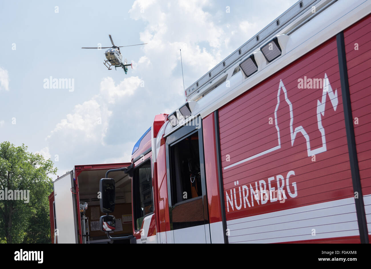 Engelmannsreuth, Germany. 11th Aug, 2015. A police helicopter lands in Engelmannsreuth, Germany, 11 August 2015. An F-16 fighter aircraft of the US Air Force crashed near Engelmannsreuth. Photo: NICOLAS ARMER/dpa/Alamy Live News Stock Photo