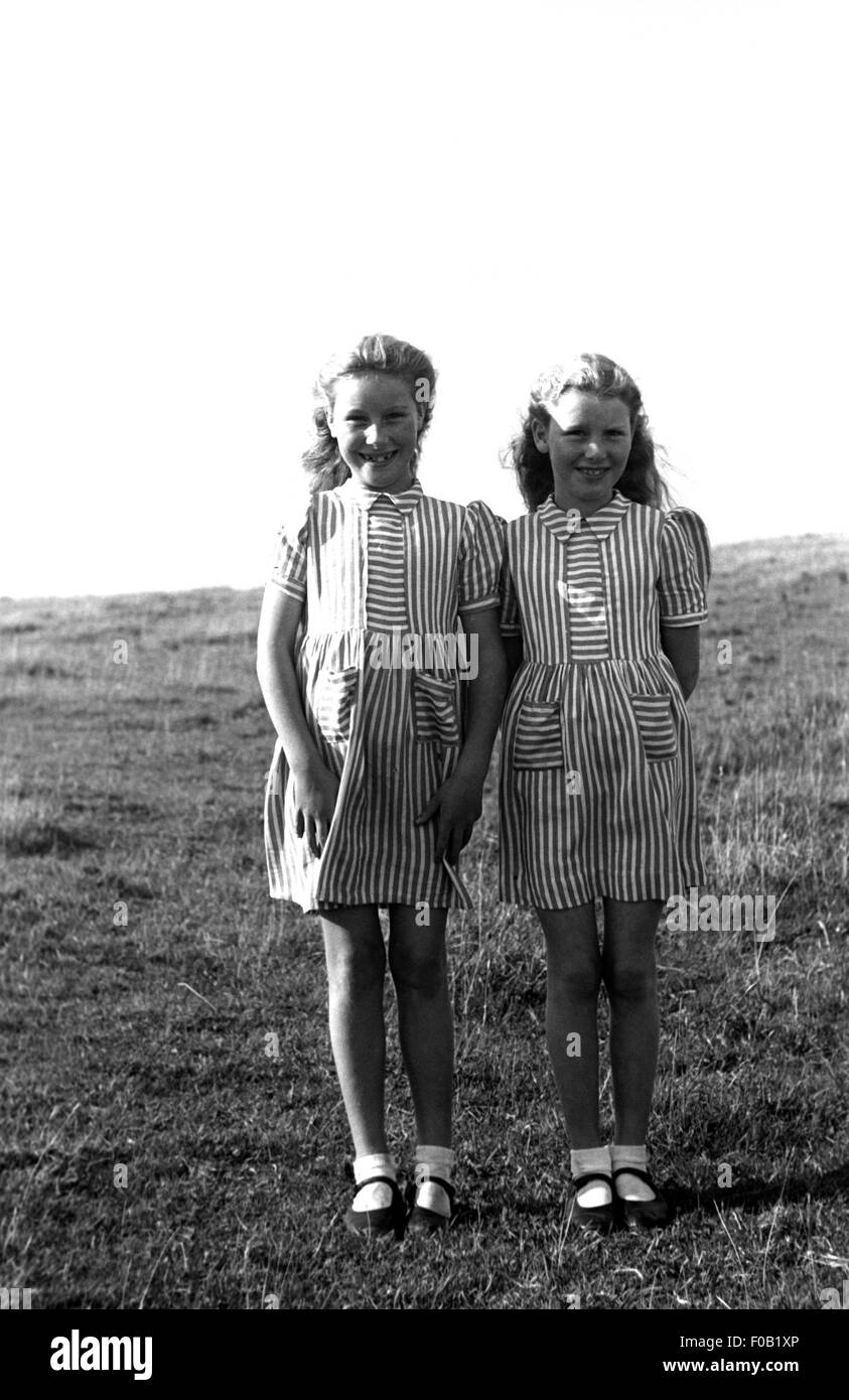 Portrait Of Twin Sisters Stock Photo - Alamy