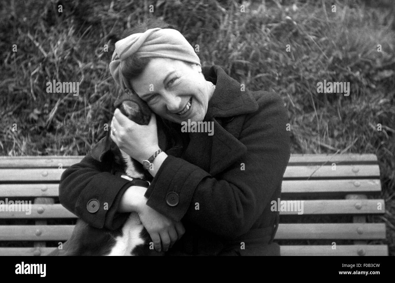Portrait of a woman with her dog Stock Photo - Alamy