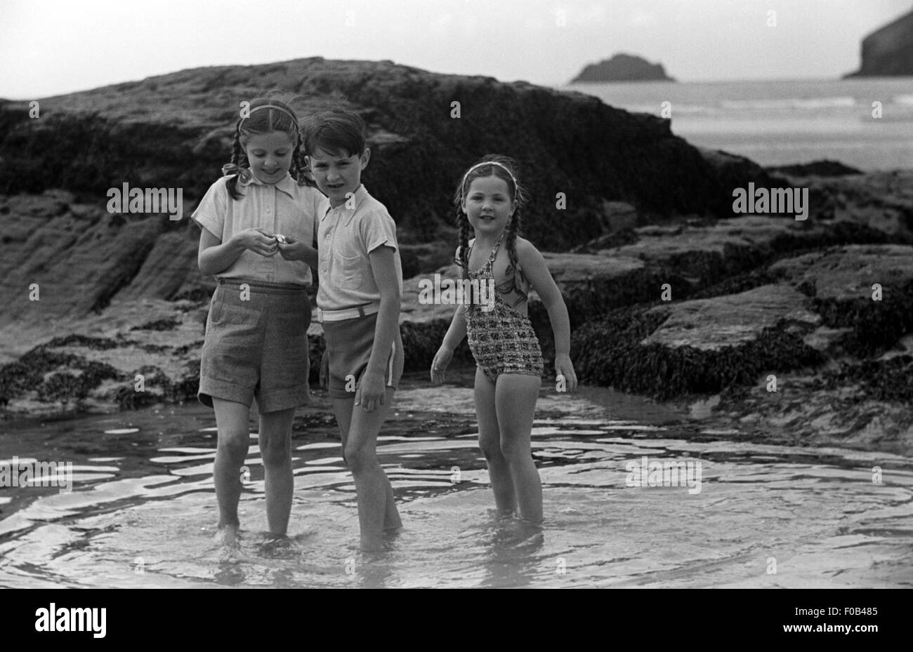 children-in-a-rock-pool-F0B485.jpg
