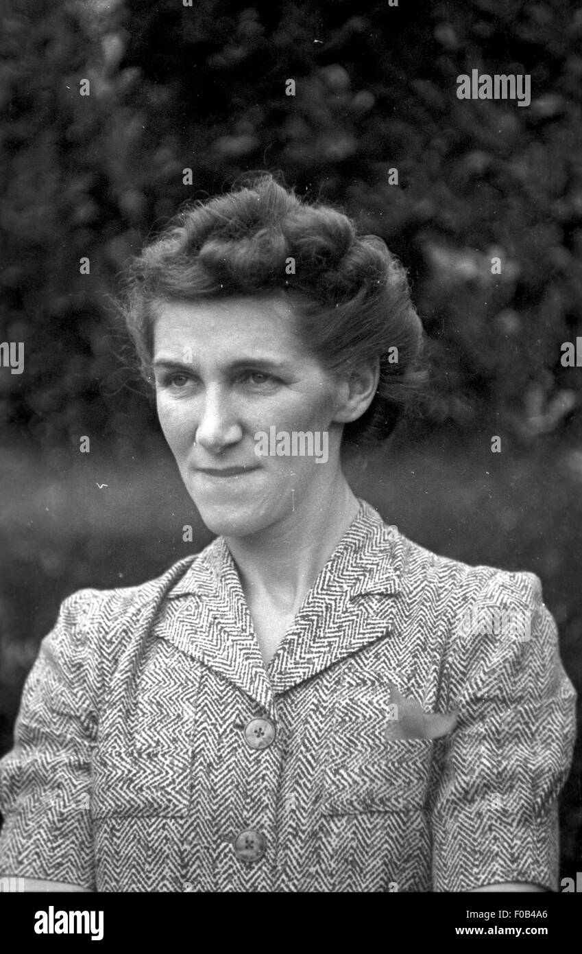 Portrait of a woman in the garden. Stock Photo