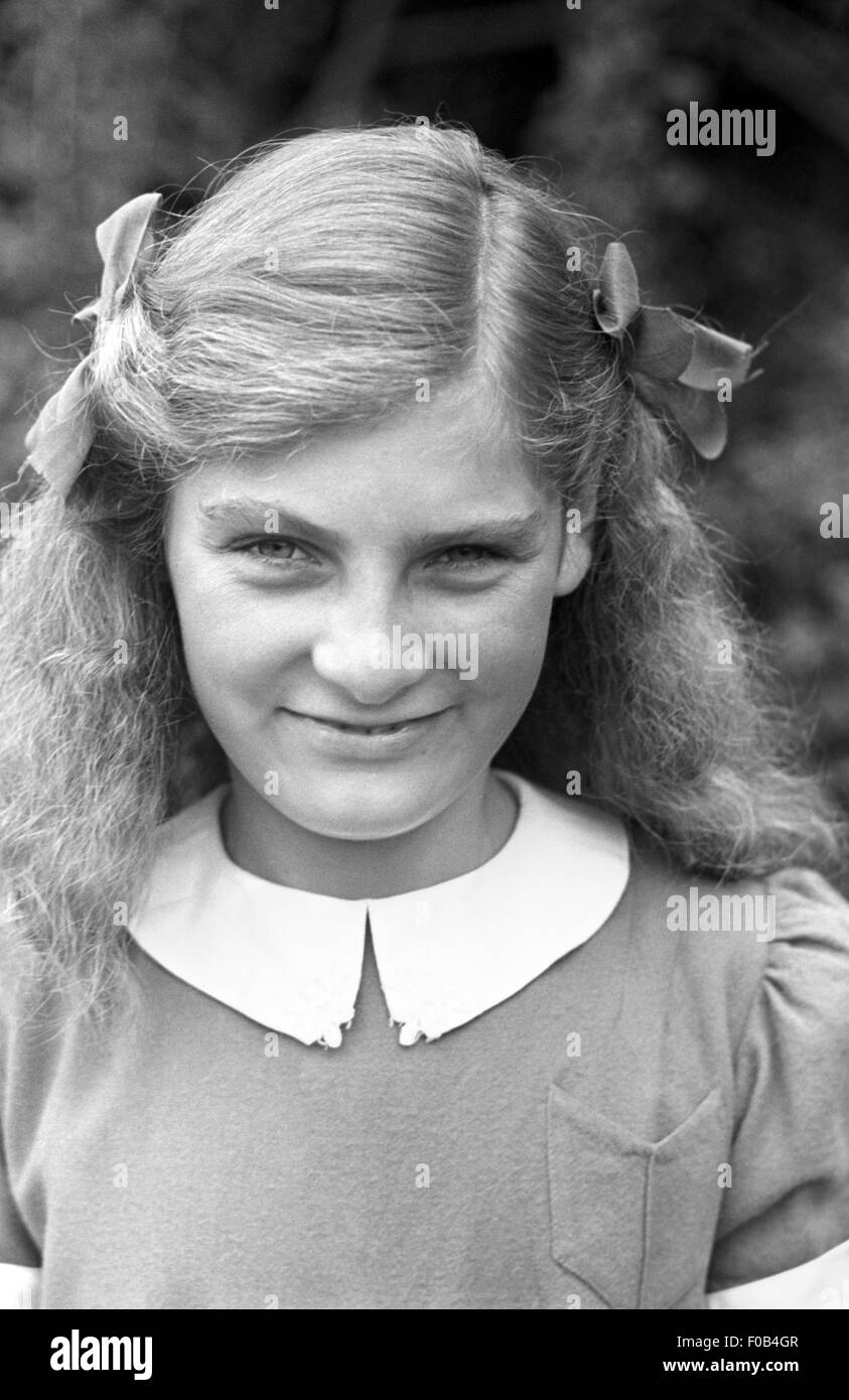 Girl with bows in her hair Stock Photo Alamy