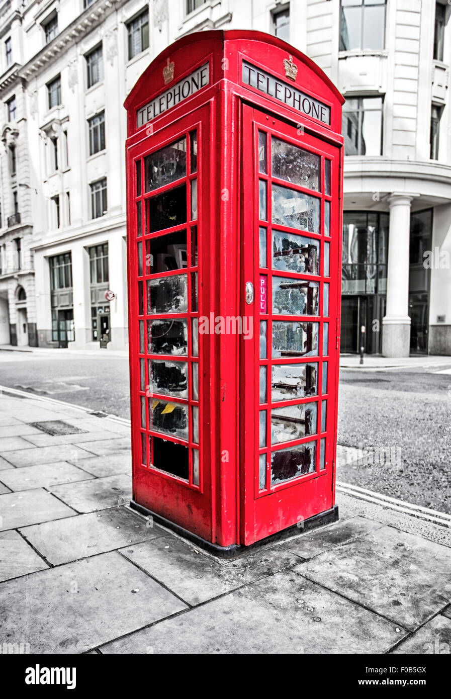 Traditional old style UK red phone box in London. Stock Photo
