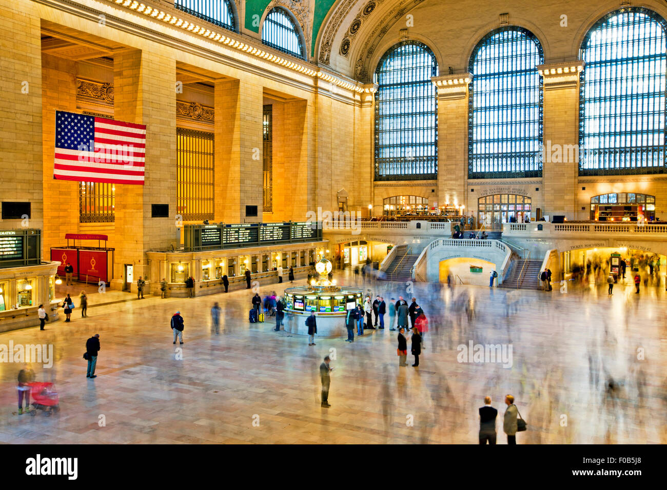 NEW YORK, USA - NOVEMBER 13th, 2014: The interior of New York's Grand Central station full of commuters long exposure. Stock Photo