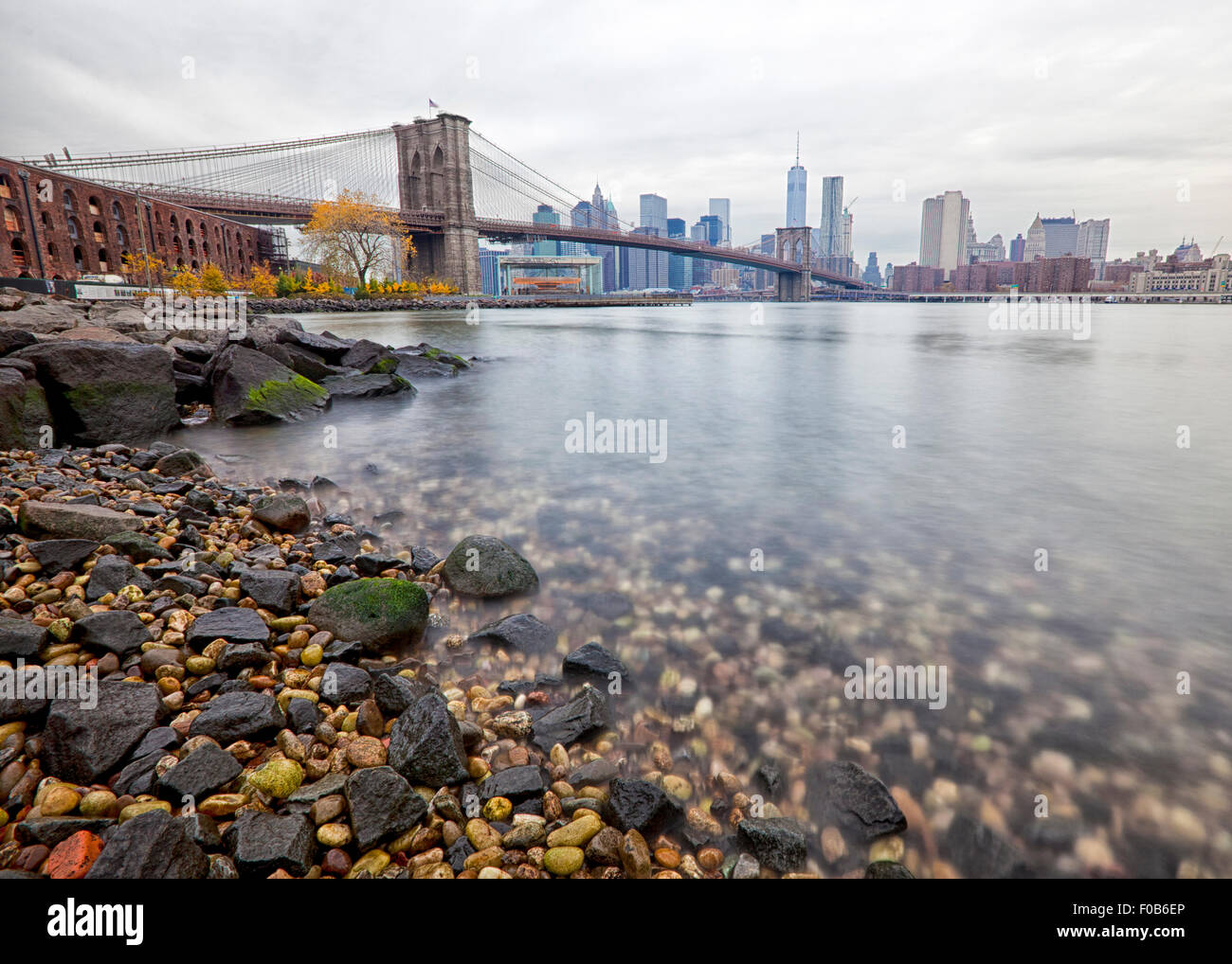 Lower Manhattan and Brooklyn bridge in New York long exposure Stock Photo
