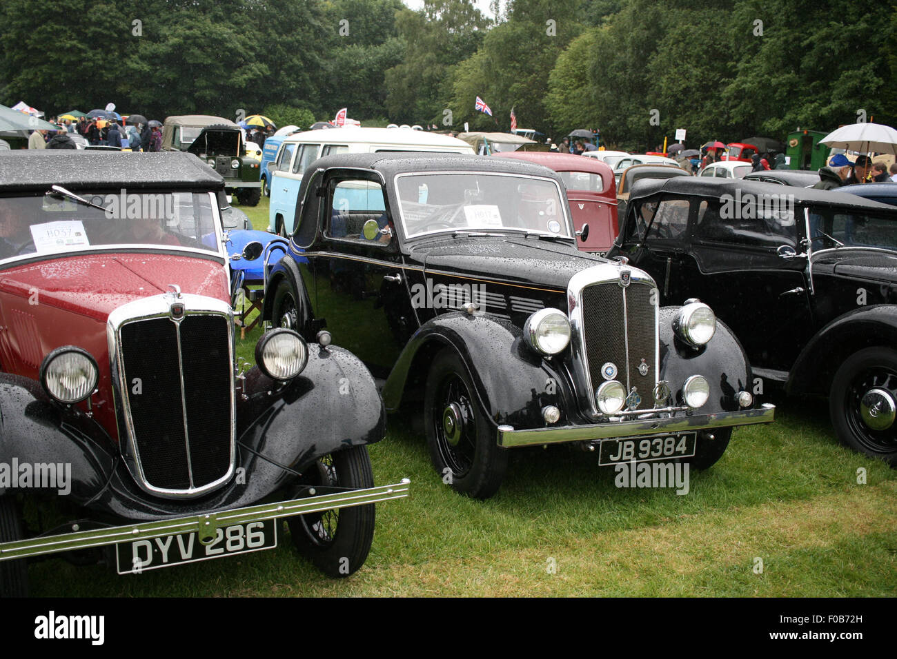 Morris 12 (centre) at a classic, vintage car show outdoors in the rain, Hebden Bridge Vintage Morris 12 (centre) at a classic, vintage car show outdoors in the rain, Hebden Bridge Vintage