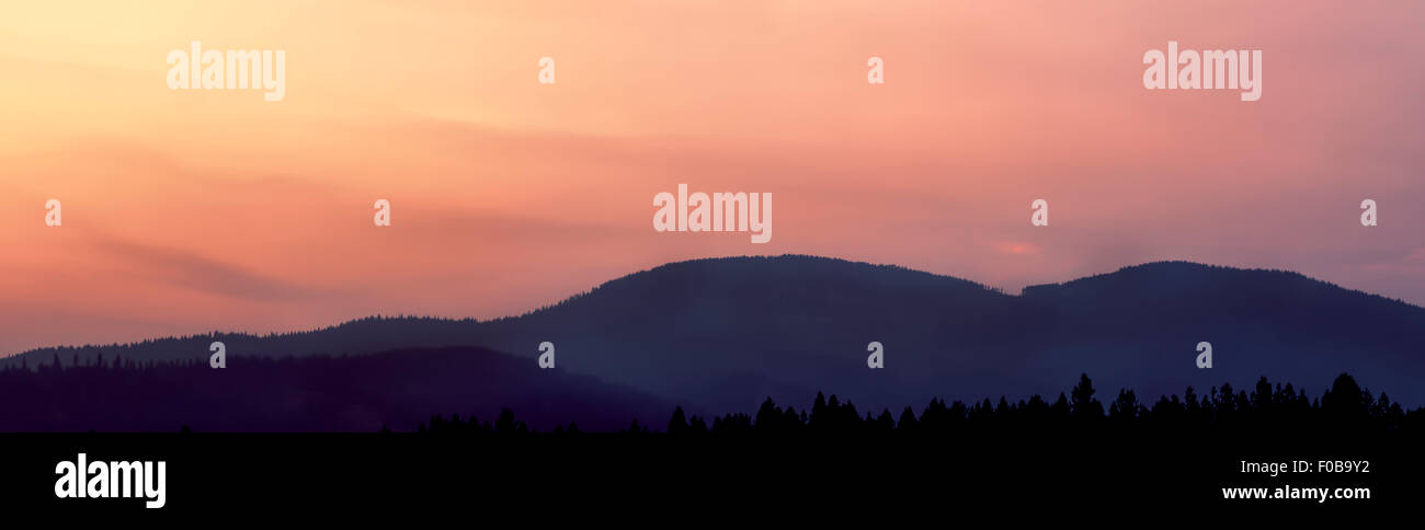 A panoramic image of Rathdrum Mountain in Idaho during sunset. Stock Photo