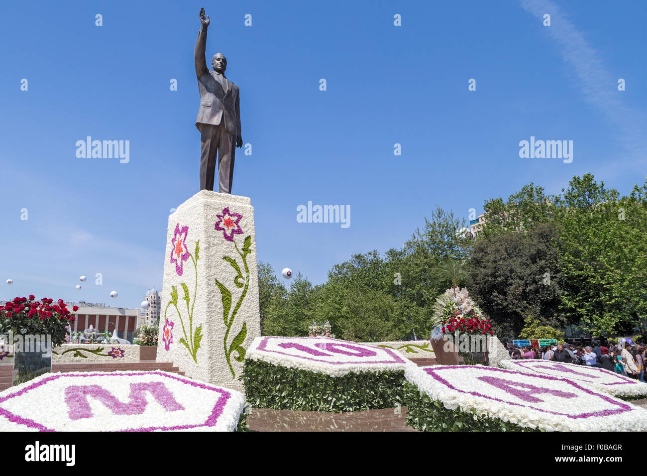 Statue of 1st President Heydar Aliyev, Republic Palace, 1st President, Heydar Aliyev, Flower festival, celebrating his birthday, Baku, Azerbaijan Stock Photo