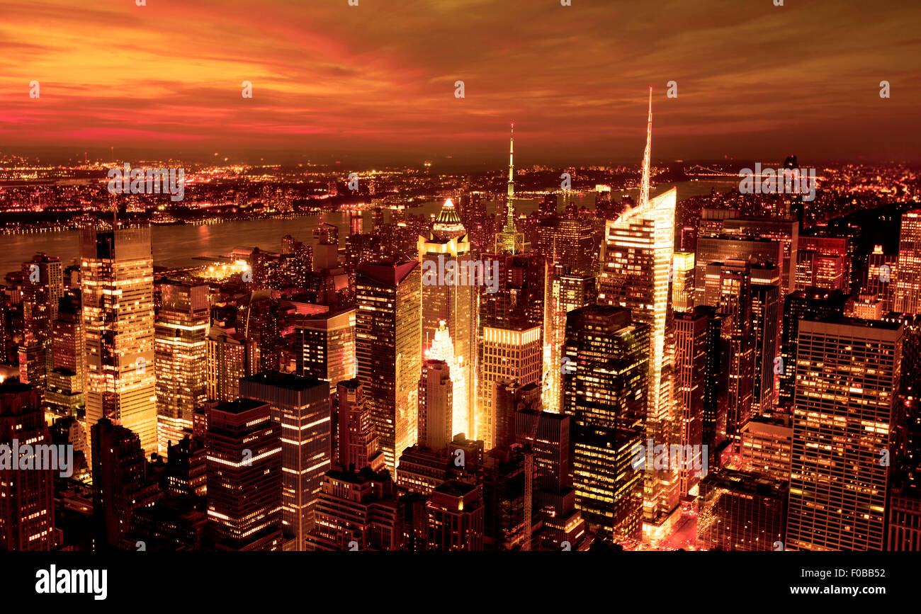 New York sunset skyline taken from the Empire State Building with gold ...