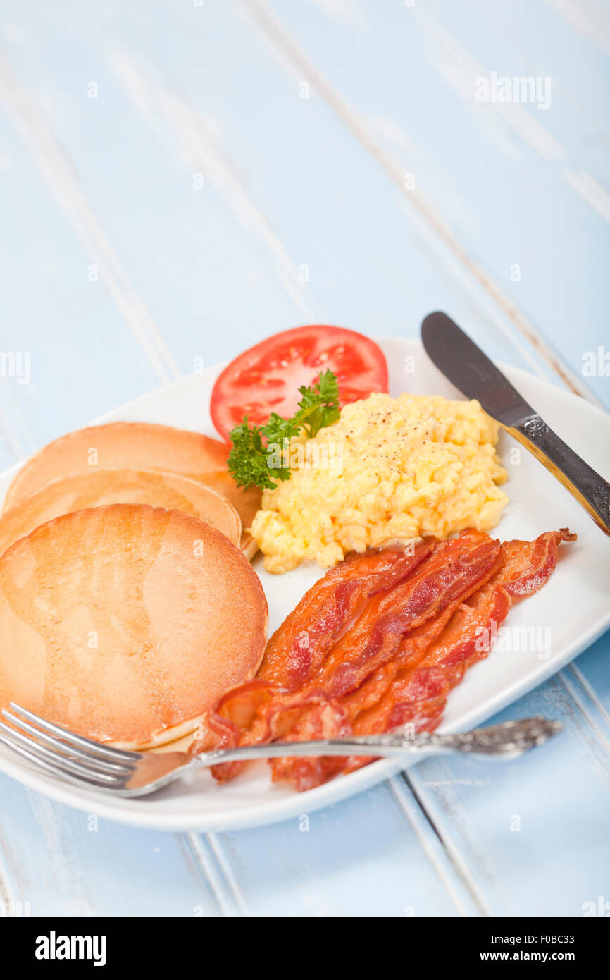 American style breakfast of pancakes, bacon and eggs Stock Photo Alamy