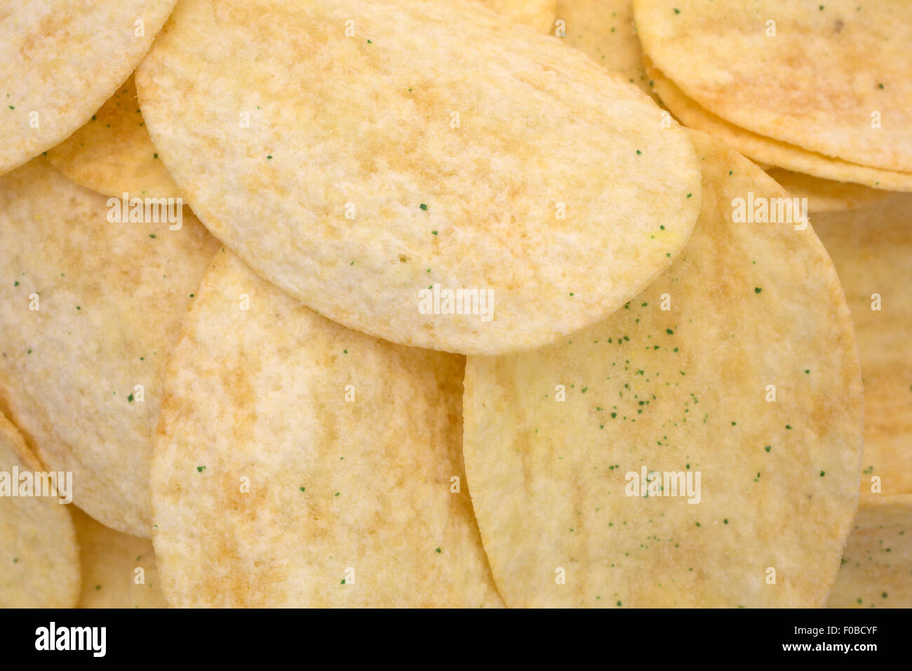 Close view of potato chips seasoned with sour cream and chives Stock