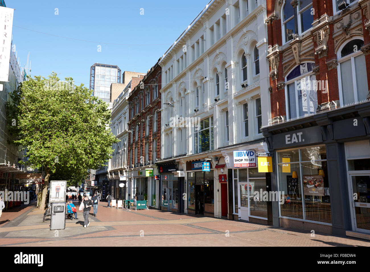 shops and old buildings on Birmingham new street city centre UK Stock