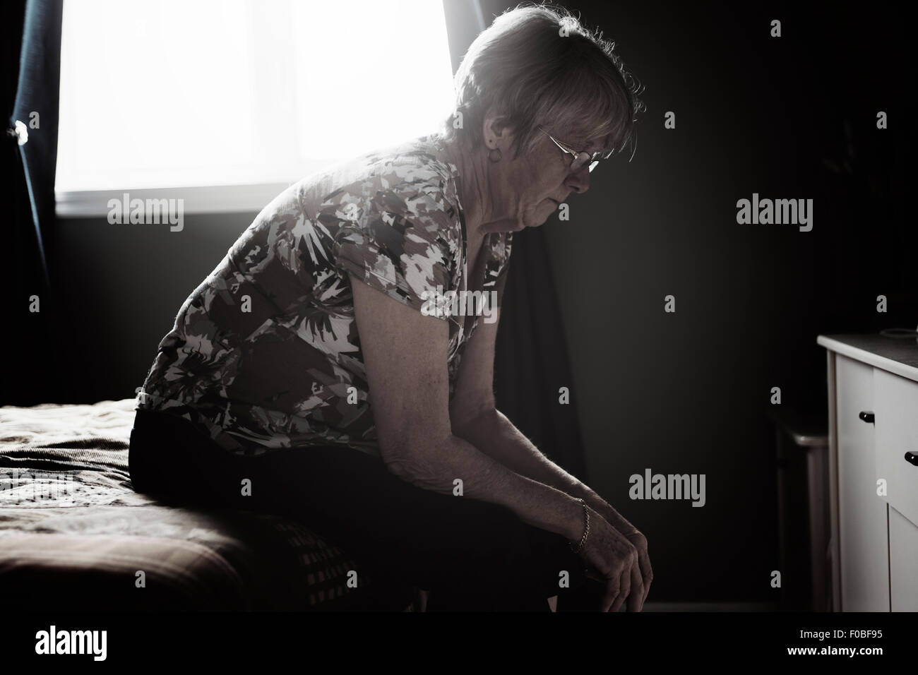 lonely 60 years old senior in is apartment Stock Photo Alamy