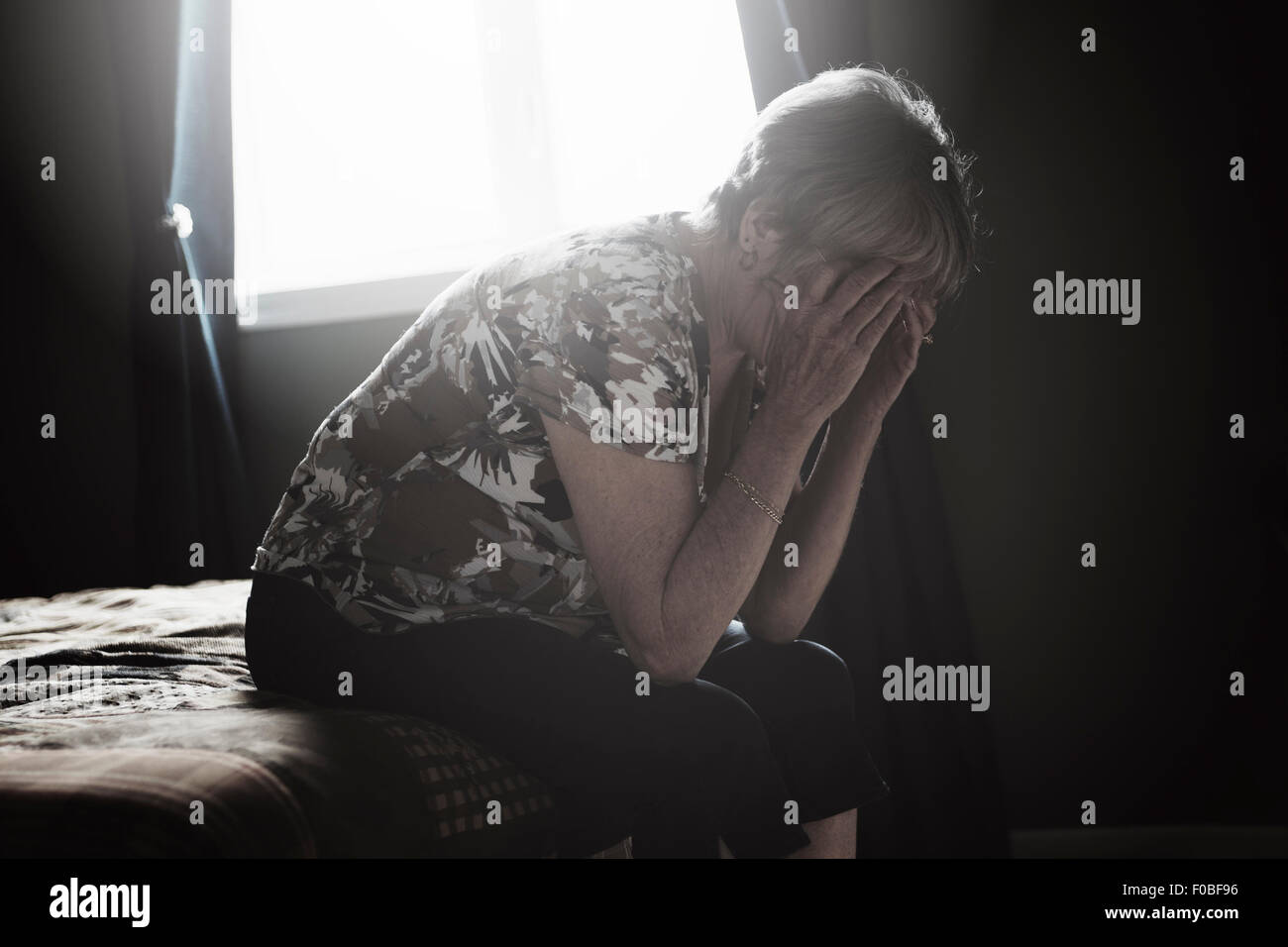 lonely 60 years old senior in is apartment Stock Photo Alamy