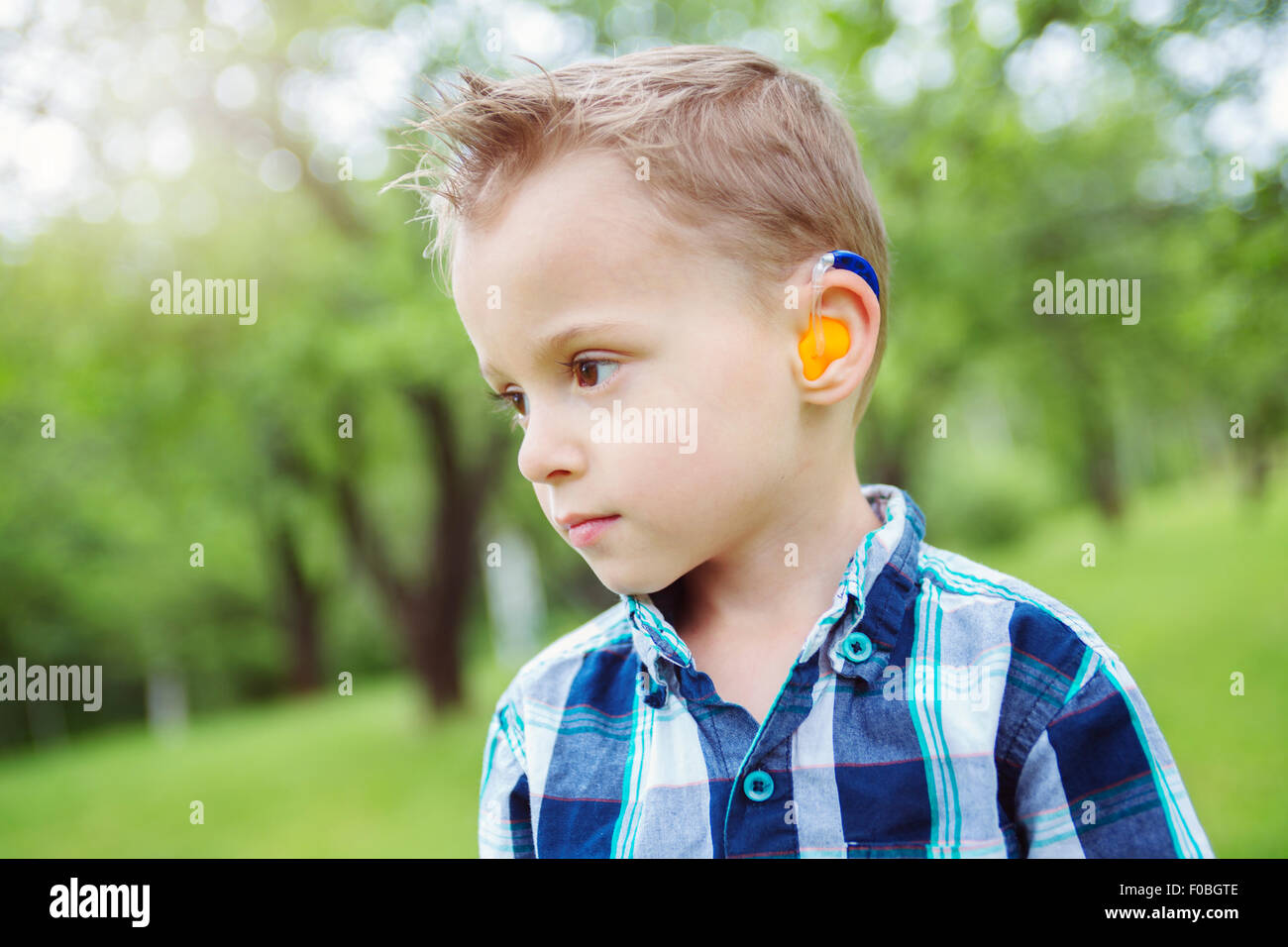 Portrait of cute little boy child outdoors on the nature Stock Photo