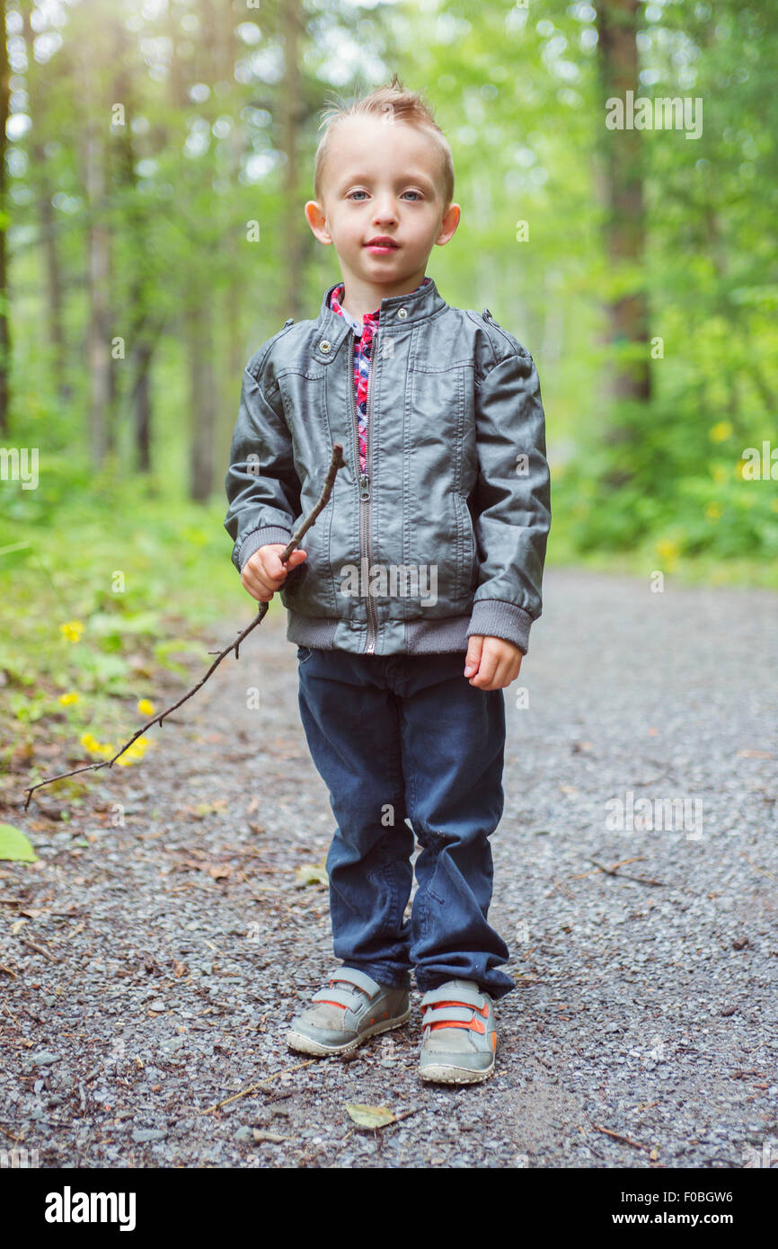 Portrait of cute little boy child outdoors on the nature Stock Photo ...