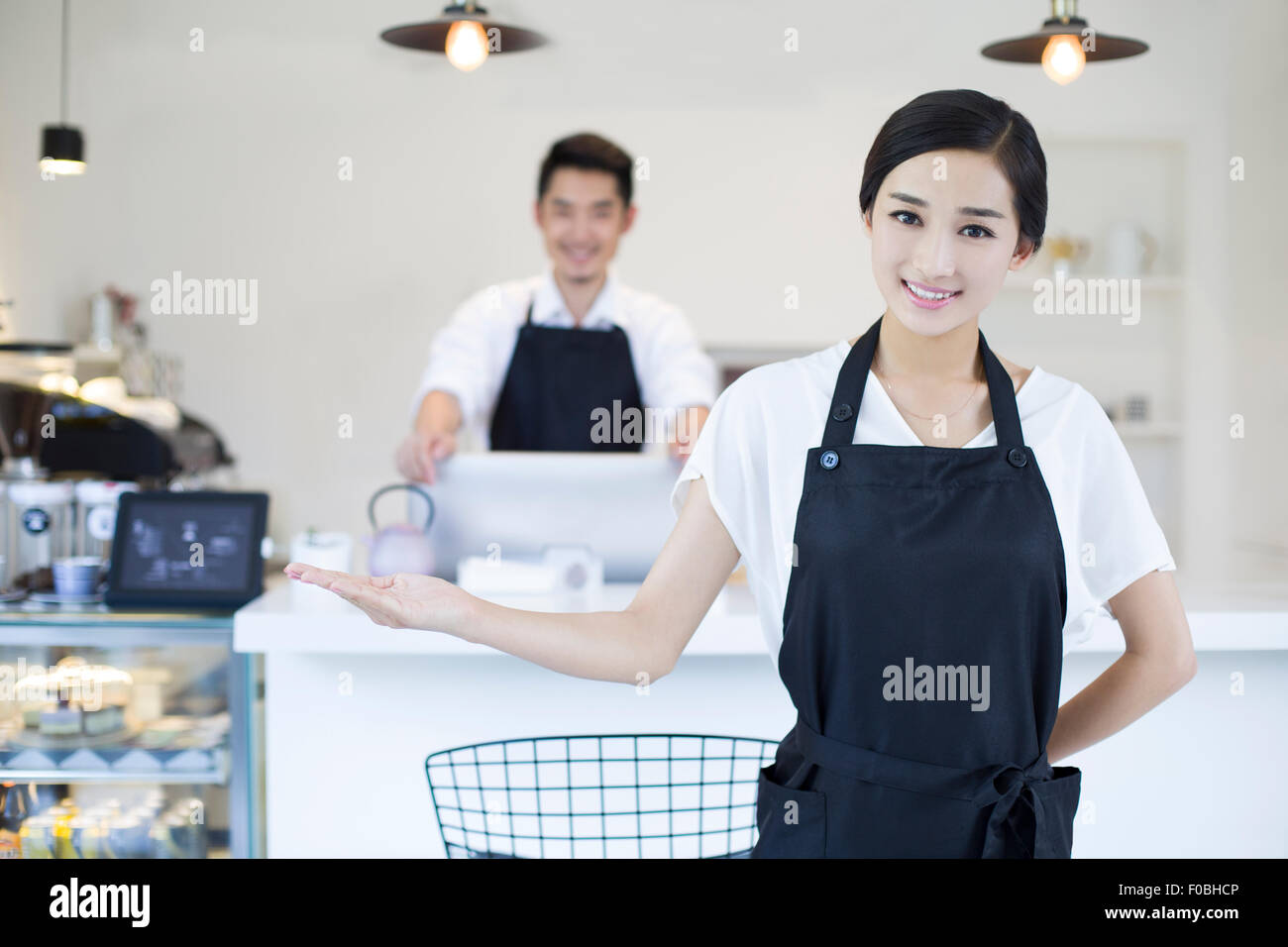 Coffee shop waitress Stock Photo Alamy