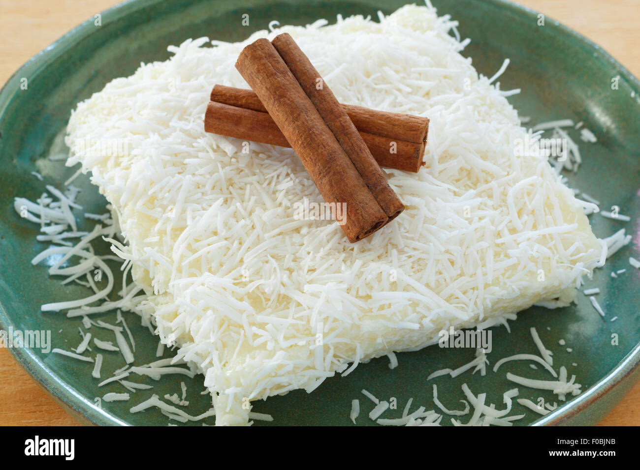 Brazilian traditional dessert sweet couscous (tapioca) pudding (cuscuz