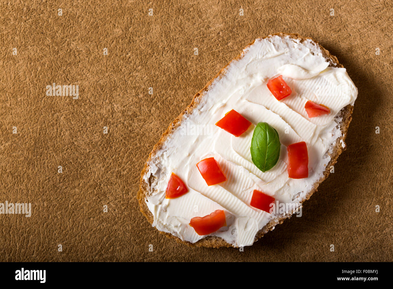 Appetizers with tomatoes and cream cheese, copy space Stock Photo