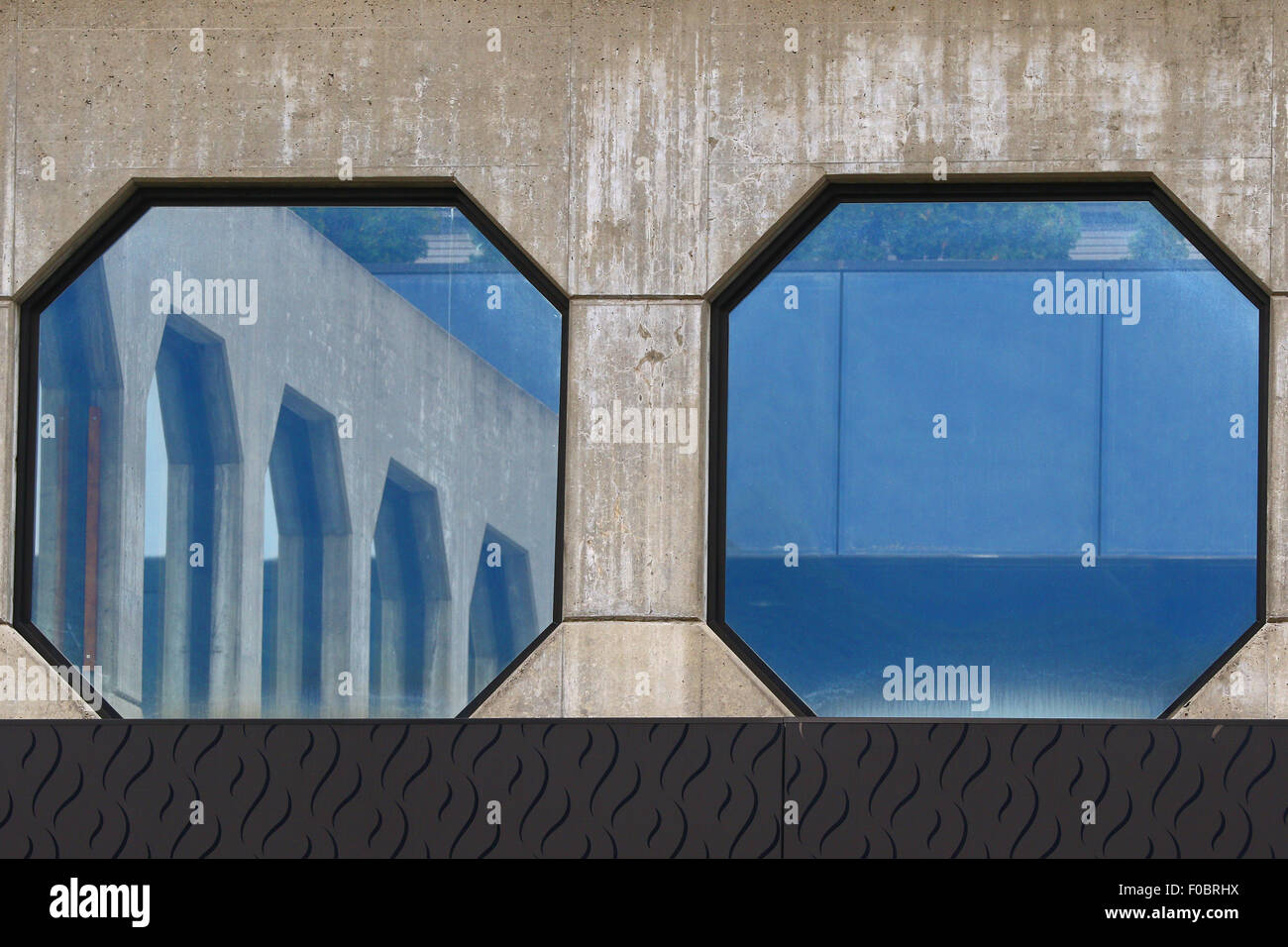 Modern architecture with octagonal windows reflecting themselves Stock ...